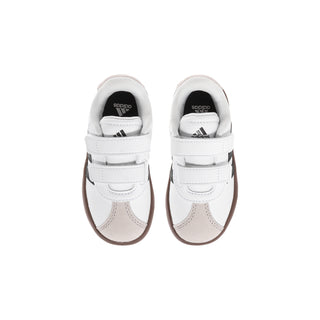 Toddler white sneakers with hook-and-loop closure, padded collar, and heel pull tab.