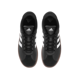 Youth black adidas lace-up sneaker with adidas logo on tongue and heel