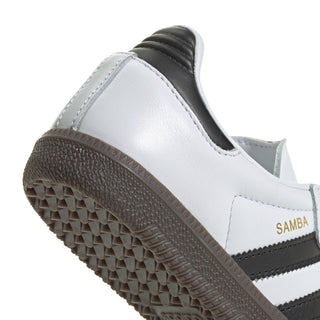 Youth adidas Samba OG sneaker close-up, white upper with black stripe and gum outsole