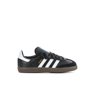 Kids black Samba OG sneakers side view, white stripes, brown gum sole