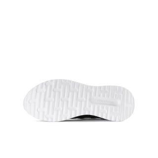 White rubber outsole with raised tread pattern for adidas youth sneakers