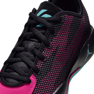 Men's basketball sneaker upper close-up, black knit with magenta dot texture