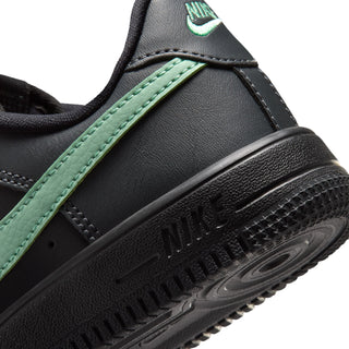Kids Nike Force 1 midsole detail with mint green stitched panel and black rubber
