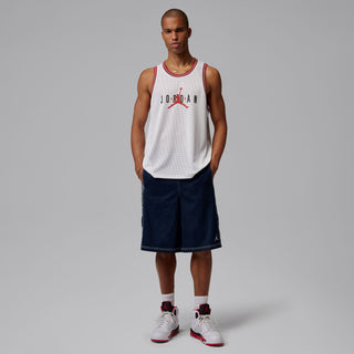 Men's white mesh basketball jersey with red trim and Jordan logo, front view