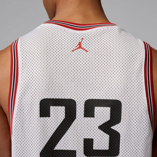 White mesh basketball jersey back close-up: number 23 with red Jordan logo