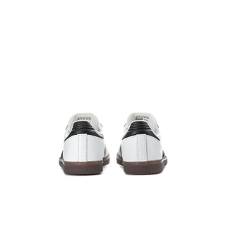 Kids adidas sneakers rear view with black heel accents and brown gum soles