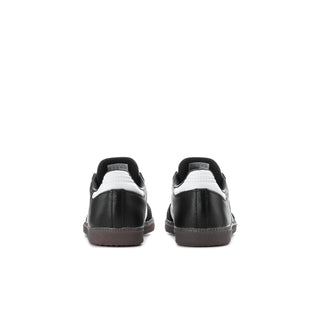 Kids black and white sneakers, rear view of pair with gum heel