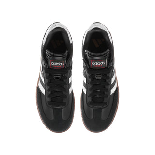Black youth Samba sneakers with red adidas tongue labels and gum-brown outsole