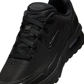 Youth black mesh upper close-up with lace system and swoosh detail