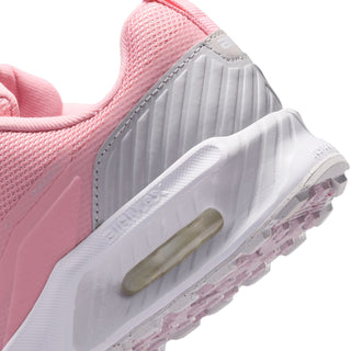 Close-up of side and heel of pink youth sneaker with air sole and tread