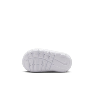 Toddler sneaker outsole view with white tread and grid pattern