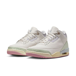 Men's retro basketball shoes pair, white uppers with mint stripes and pink outsole