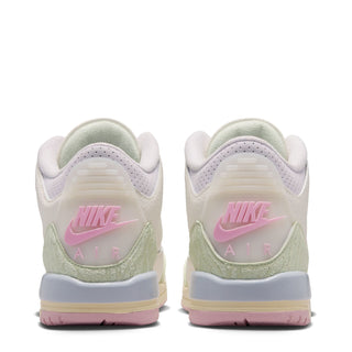 Youth sneakers heel view, white with sage green detail and Nike Air branding