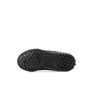 Kids black soccer cleats outsole with molded traction studs