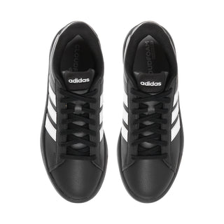 Pair of black sneakers with lace-up front and padded collars
