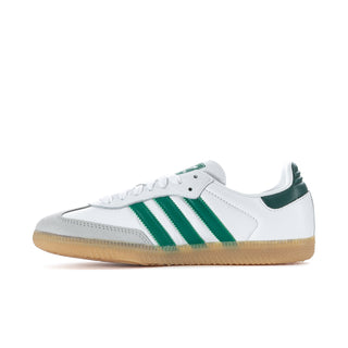 White womens sneakers with green triple stripes, low-top lace-up design