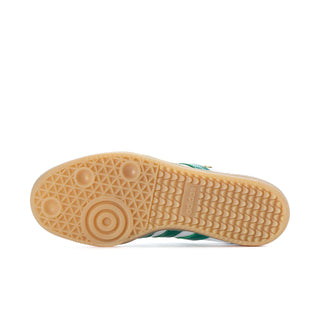 White womens sneaker outsole with gum rubber tread and Adidas logo