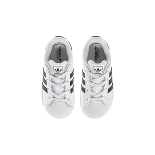Toddler sneakers, back view: white uppers with black heel and adidas branding