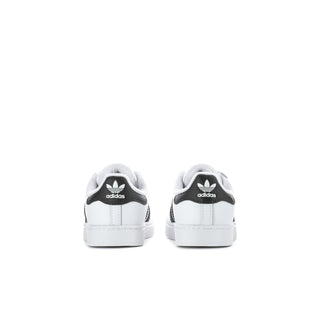 Toddler sneakers back view in white with black heel tabs and adidas logo