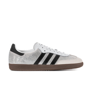 Rhinestone-embellished low-top sneakers with black stripes and gum sole