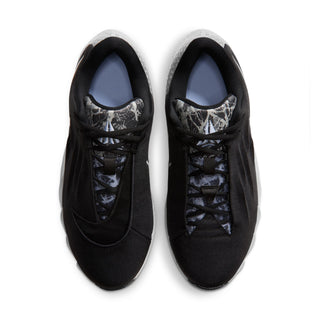 Men's black low-top sneakers with lace-up front and patterned heel lining