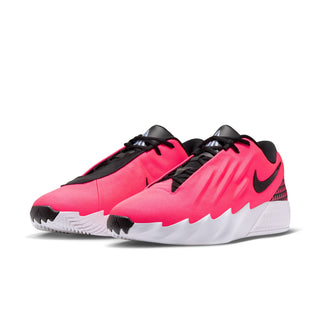 Two men's athletic sneakers in bright pink, black laces, and white soles, angled view