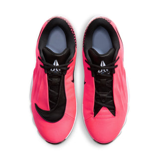 Men's low-top athletic shoes in bright pink with black laces and textured sides