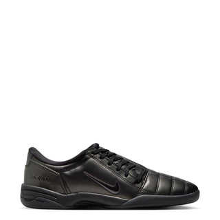 Women's T90 black lace-up sneakers with Nike swoosh, quilted leather-look upper.