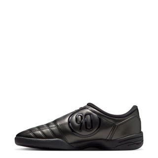 Women's T90 black sneaker heel with 90 logo emboss and padded collar.