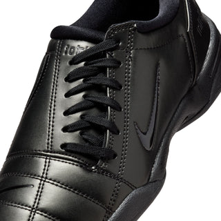 Women's T90 black leather sneakers, lace-up with Nike swoosh and stitched panels.