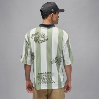 Men's goalie top back view: light green and white stripes with large “Somos” graphic