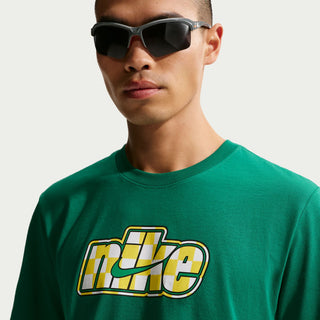 Men's malachite green sport tee with Nike logo graphic and crew neckline detail.