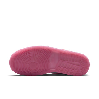 Air Jordan 1 mid-top sneakers outsole view, pink rubber tread and sidewall texture