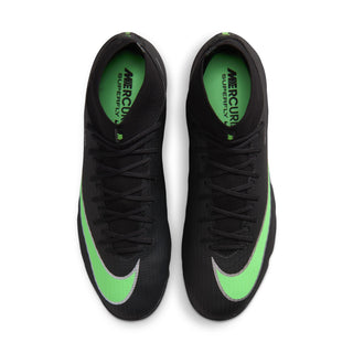 Pair of men's black turf football boots with green accents and lace-up tops