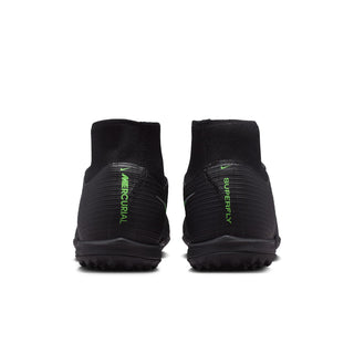 Men's black turf football boots with green branding on heel, lace closure