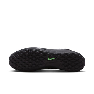 Black turf football boot outsole with diamond traction pattern and green logo