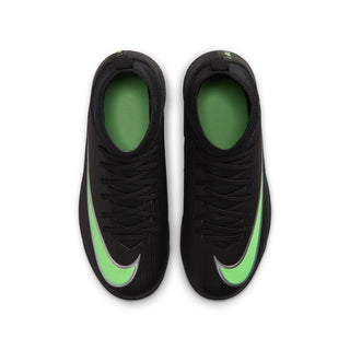 Youth soccer cleats pair with black uppers and bright neon green lining