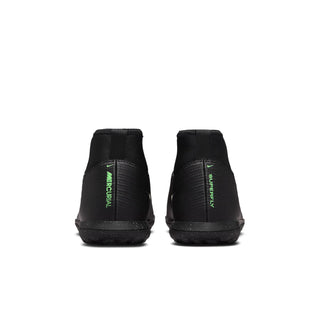 Youth turf soccer cleats with black heel and neon green heel text