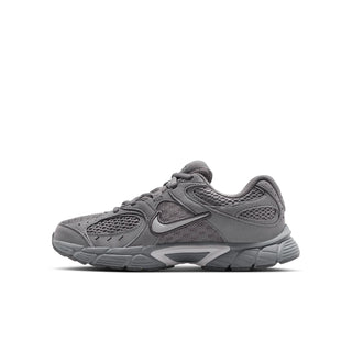 Youth running shoes in dark gray with swoosh detail and breathable mesh toe panels