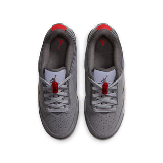 Pair of youth low-top sneakers, cool gray uppers with red lace tips