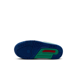 Kids retro sneakers outsole view, dark blue tread with green JORDAN logo panel