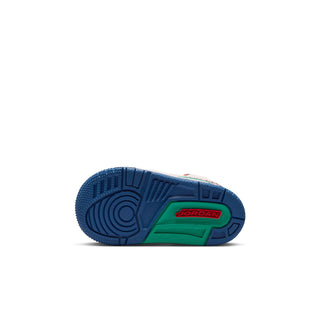 Toddler sneaker outsole in dark blue with green accent and JORDAN logo