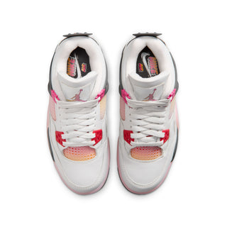 Youth sneakers, white uppers with red laces and multicolor tongue lining, top view