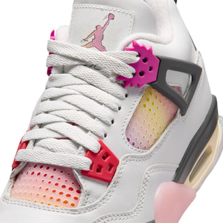Youth sneaker upper detail, white laces with Jordan logo and pink lace tag