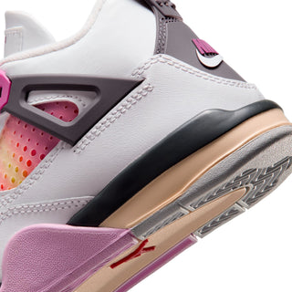 Kids sneaker side close-up, white leather with gray strap, tan sole, and purple trim