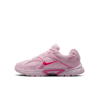 Youth light pink running shoes with bright pink swoosh and textured mesh panels