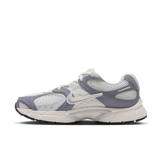 Side view of a Nike V5 RNR women's sneaker with mesh panels and a white Swoosh