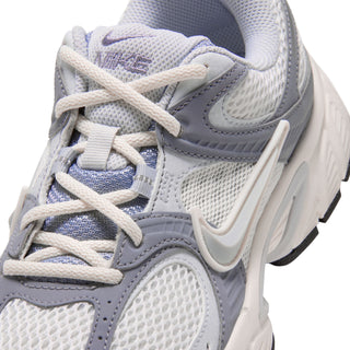Close-up of Nike V5 RNR sneaker laces, mesh panels, gray overlays and side Swoosh