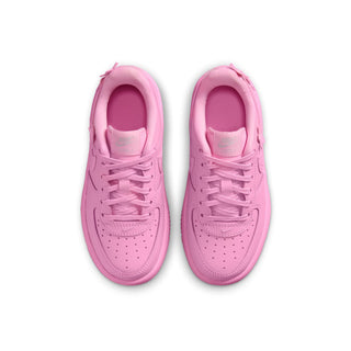 Kids' pink low-top lace sneakers, front view with laces and perforated toe