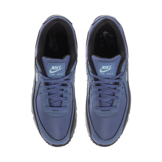Men's blue lace-up sneakers shown from toe with black interior lining